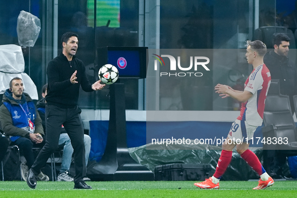 Mikel Arteta Head Coach of Arsenal gestures during the UEFA Champions League 2024/25 League Phase MD4 match between FC Internazionale and Ar...