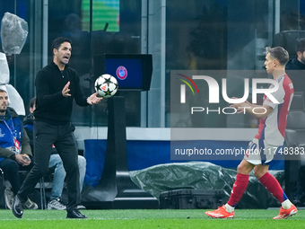 Mikel Arteta Head Coach of Arsenal gestures during the UEFA Champions League 2024/25 League Phase MD4 match between FC Internazionale and Ar...