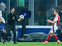 Mikel Arteta Head Coach of Arsenal gestures during the UEFA Champions League 2024/25 League Phase MD4 match between FC Internazionale and Ar...