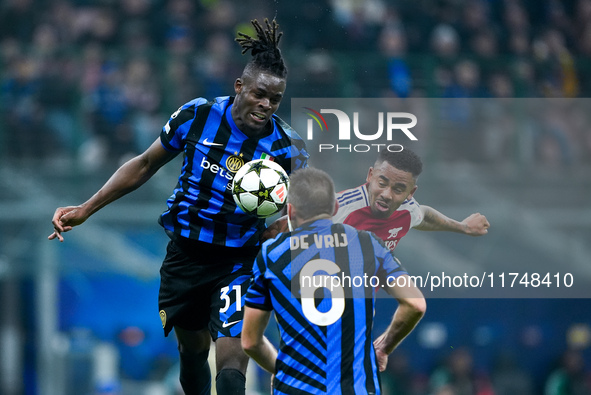 Gabriel Jesus of Arsenal and Yann Aurel Bisseck of FC Internazionale jump for the ball during the UEFA Champions League 2024/25 League Phase...