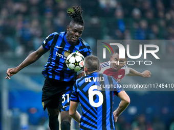 Gabriel Jesus of Arsenal and Yann Aurel Bisseck of FC Internazionale jump for the ball during the UEFA Champions League 2024/25 League Phase...