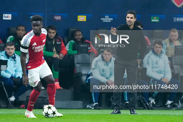 Mikel Arteta Head Coach of Arsenal gestures during the UEFA Champions League 2024/25 League Phase MD4 match between FC Internazionale and Ar...