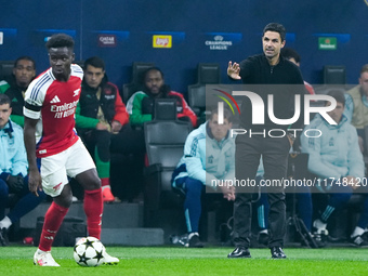 Mikel Arteta Head Coach of Arsenal gestures during the UEFA Champions League 2024/25 League Phase MD4 match between FC Internazionale and Ar...