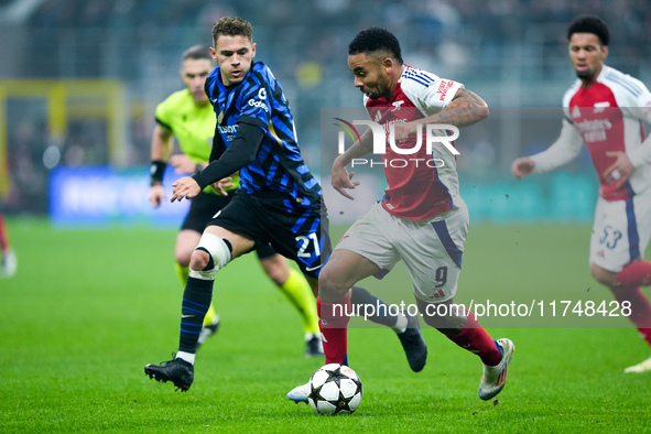 Gabriel Jesus of Arsenal and Kristjan Asllani of FC Internazionale compete for the ball during the UEFA Champions League 2024/25 League Phas...