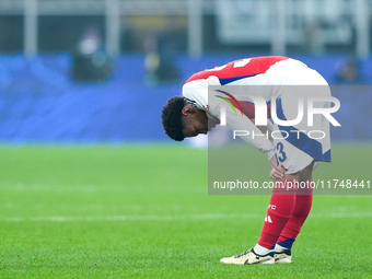 Ethan Nwaneri of Arsenal looks dejected at the end of the UEFA Champions League 2024/25 League Phase MD4 match between FC Internazionale and...