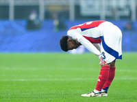 Ethan Nwaneri of Arsenal looks dejected at the end of the UEFA Champions League 2024/25 League Phase MD4 match between FC Internazionale and...