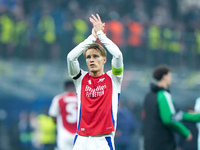 Martin Odegaard of Arsenal greets the fans during the UEFA Champions League 2024/25 League Phase MD4 match between FC Internazionale and Ars...