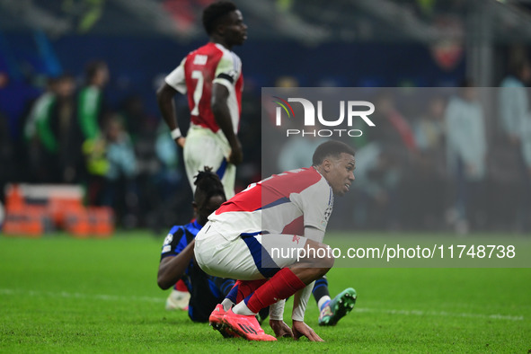 Gabriel Magalhaes of Arsenal looks on during the Champions League match between Inter Milan and Arsenal at San Siro Stadium in Milan, Italy,...