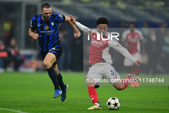 Ethan Nwaneri of Arsenal is in action during the Champions League match between Inter Milan and Arsenal at San Siro Stadium in Milan, Italy,...