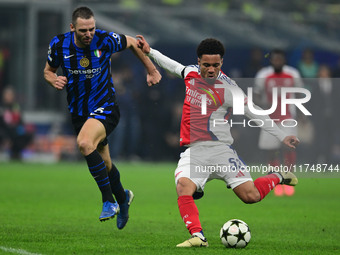 Ethan Nwaneri of Arsenal is in action during the Champions League match between Inter Milan and Arsenal at San Siro Stadium in Milan, Italy,...