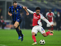 Ethan Nwaneri of Arsenal is in action during the Champions League match between Inter Milan and Arsenal at San Siro Stadium in Milan, Italy,...