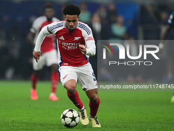 Ethan Nwaneri of Arsenal is in action during the Champions League match between Inter Milan and Arsenal at San Siro Stadium in Milan, Italy,...