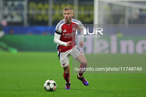 Oleksandr Zinchenko of Arsenal is in action during the Champions League match between Inter Milan and Arsenal at San Siro Stadium in Milan,...