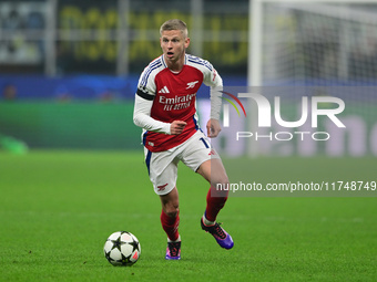 Oleksandr Zinchenko of Arsenal is in action during the Champions League match between Inter Milan and Arsenal at San Siro Stadium in Milan,...