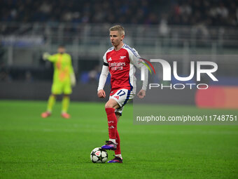 Oleksandr Zinchenko of Arsenal is in action during the Champions League match between Inter Milan and Arsenal at San Siro Stadium in Milan,...