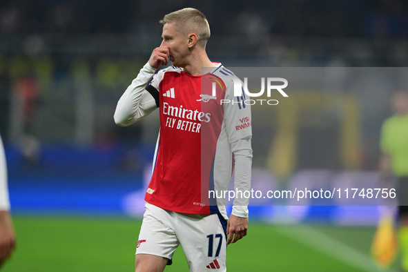 Oleksandr Zinchenko of Arsenal is in action during the Champions League match between Inter Milan and Arsenal at San Siro Stadium in Milan,...