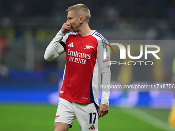 Oleksandr Zinchenko of Arsenal is in action during the Champions League match between Inter Milan and Arsenal at San Siro Stadium in Milan,...