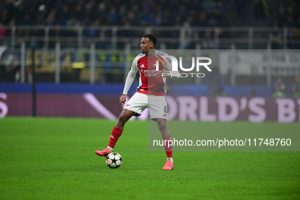 Gabriel Magalhaes of Arsenal is in action during the Champions League match between Inter Milan and Arsenal at San Siro Stadium in Milan, It...