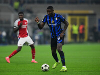 Marcos Thuram of Inter Milan is in action during the Champions League match between Inter Milan and Arsenal at San Siro Stadium in Milan, It...