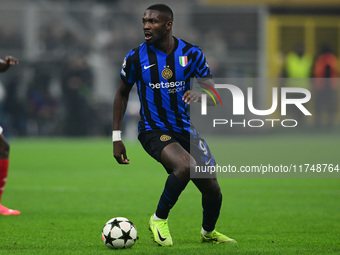 Marcos Thuram of Inter Milan is in action during the Champions League match between Inter Milan and Arsenal at San Siro Stadium in Milan, It...