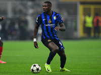 Marcos Thuram of Inter Milan is in action during the Champions League match between Inter Milan and Arsenal at San Siro Stadium in Milan, It...