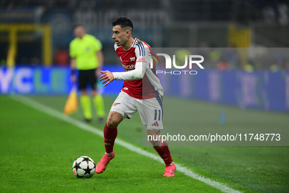 Gabriel Martinelli of Arsenal is in action during the Champions League match between Inter Milan and Arsenal at San Siro Stadium in Milan, I...