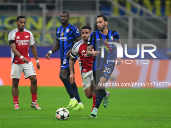 Hakan Calhanoglu of Inter Milan is in action during the Champions League match between Inter Milan and Arsenal at San Siro Stadium in Milan,...