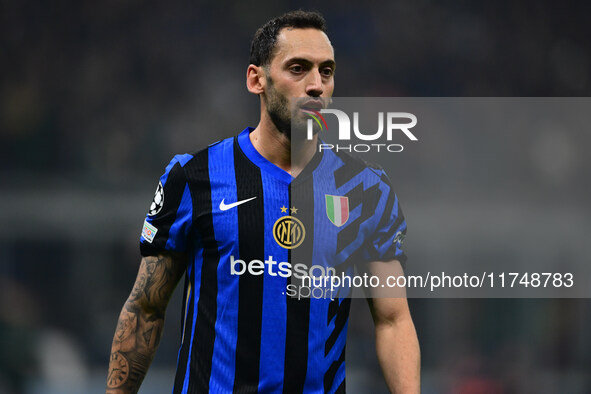 Hakan Calhanoglu of Inter Milan looks on during the Champions League match between Inter Milan and Arsenal at San Siro Stadium in Milan, Ita...