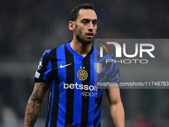 Hakan Calhanoglu of Inter Milan looks on during the Champions League match between Inter Milan and Arsenal at San Siro Stadium in Milan, Ita...