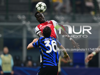 Bukayo Saka of Arsenal is in action during the Champions League match between Inter Milan and Arsenal at San Siro Stadium in Milan, Italy, o...