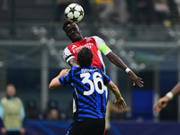 Bukayo Saka of Arsenal is in action during the Champions League match between Inter Milan and Arsenal at San Siro Stadium in Milan, Italy, o...