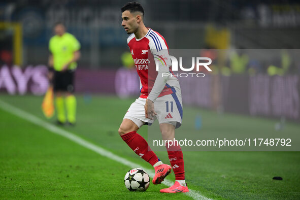 Gabriel Martinelli of Arsenal is in action during the Champions League match between Inter Milan and Arsenal at San Siro Stadium in Milan, I...