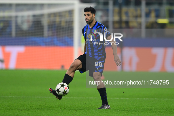 Mehdi Taremi of Inter Milan is in action during the Champions League match between Inter Milan and Arsenal at San Siro Stadium in Milan, Ita...