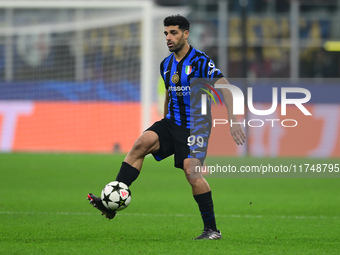 Mehdi Taremi of Inter Milan is in action during the Champions League match between Inter Milan and Arsenal at San Siro Stadium in Milan, Ita...