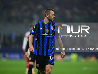 Hakan Calhanoglu of Inter Milan looks on during the Champions League match between Inter Milan and Arsenal at San Siro Stadium in Milan, Ita...