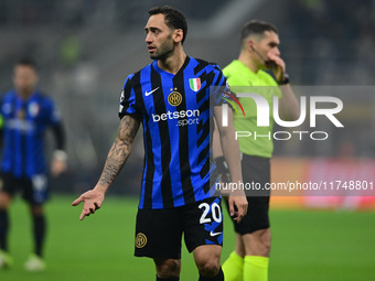 Hakan Calhanoglu of Inter Milan looks on during the Champions League match between Inter Milan and Arsenal at San Siro Stadium in Milan, Ita...