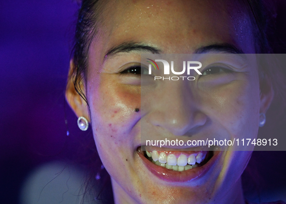 RIYADH, SAUDI ARABIA - NOVEMBER 06: Quinwen Zheng of China speaks to the media after her win  against Jasmine Paolini of Italy, on Day 5 of...