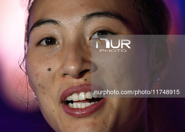 RIYADH, SAUDI ARABIA - NOVEMBER 06: Quinwen Zheng of China speaks to the media after her win  against Jasmine Paolini of Italy, on Day 5 of...