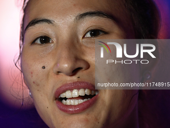 RIYADH, SAUDI ARABIA - NOVEMBER 06: Quinwen Zheng of China speaks to the media after her win  against Jasmine Paolini of Italy, on Day 5 of...