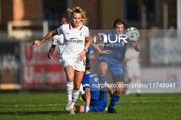 Nikola Karczewska of Milan Women battles for the ball with Margherita Brscic of Freedom Cuneo during the Women's Coppa Italia match between...