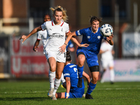 Nikola Karczewska of Milan Women battles for the ball with Margherita Brscic of Freedom Cuneo during the Women's Coppa Italia match between...