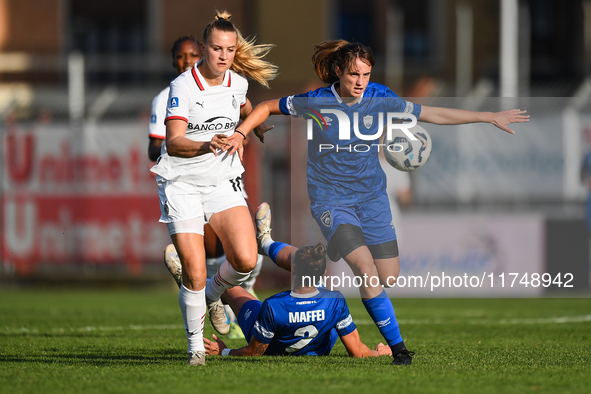 Nikola Karczewska of Milan Women battles for the ball with Margherita Brscic of Freedom Cuneo during the Women's Coppa Italia match between...