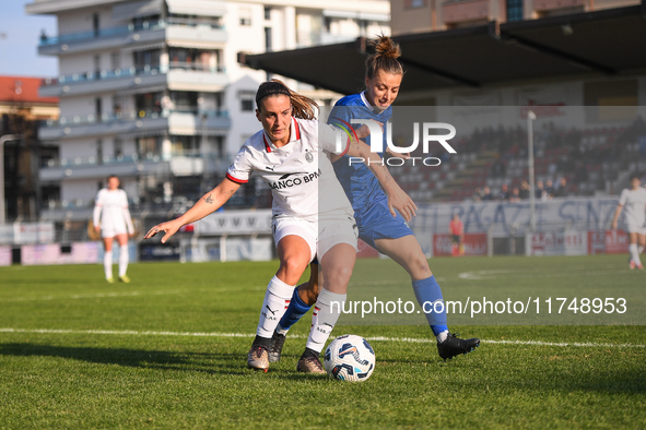 Gloria Marinelli of Milan Women battles for the ball with Sara Borello of Freedom Cuneo during the Women's Coppa Italia match between Freedo...