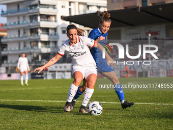 Gloria Marinelli of Milan Women battles for the ball with Sara Borello of Freedom Cuneo during the Women's Coppa Italia match between Freedo...