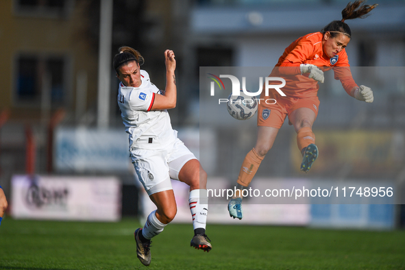 Gloria Marinelli of Milan Women competes for the ball with Maria Korenciova of Freedom Cuneo during the Women's Coppa Italia match between F...