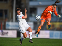 Gloria Marinelli of Milan Women competes for the ball with Maria Korenciova of Freedom Cuneo during the Women's Coppa Italia match between F...