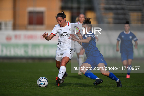 Gloria Marinelli of Milan Women battles for the ball with Sara Borello of Freedom Cuneo during the Women's Coppa Italia match between Freedo...