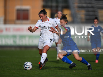 Gloria Marinelli of Milan Women battles for the ball with Sara Borello of Freedom Cuneo during the Women's Coppa Italia match between Freedo...