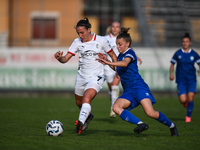 Gloria Marinelli of Milan Women battles for the ball with Sara Borello of Freedom Cuneo during the Women's Coppa Italia match between Freedo...