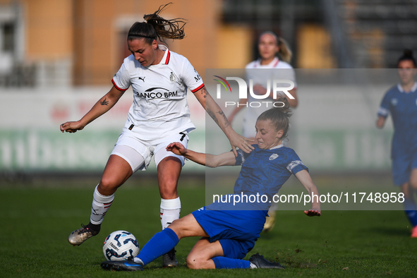 Gloria Marinelli of Milan Women battles for the ball with Sara Borello of Freedom Cuneo during the Women's Coppa Italia match between Freedo...